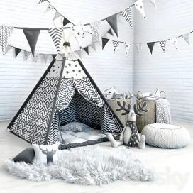 Wigwam with a mattress pillows fur skins baskets flags deer